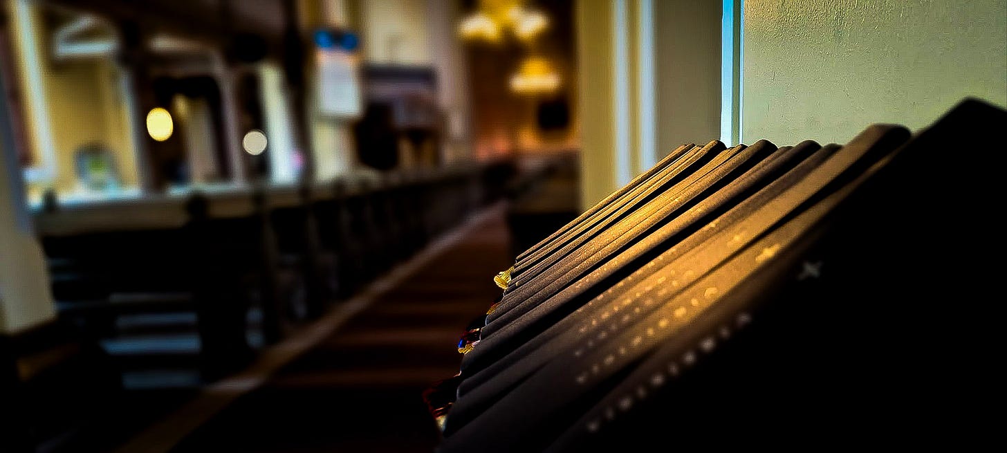 Hymnals stacked in a church in Finland.