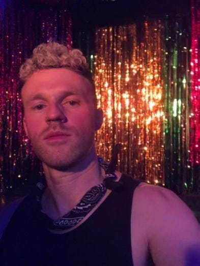 A person in a black tank top
Description automatically generated A person in a black tank top
Description automatically generated