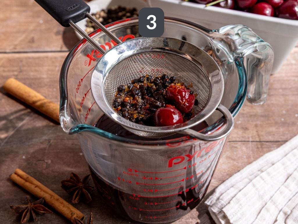 Homemade Dr. Pepper Step 3 - strain. Homemade Dr. Pepper Step 3 - strain.