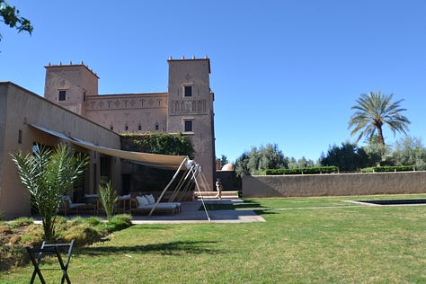 Moments from Dar Ahlam showing the thoughtful hospitality experience - the kasbah grounds, intimate dining spaces, desert excursions, and candlelit dinners that exemplified genuine welcome.