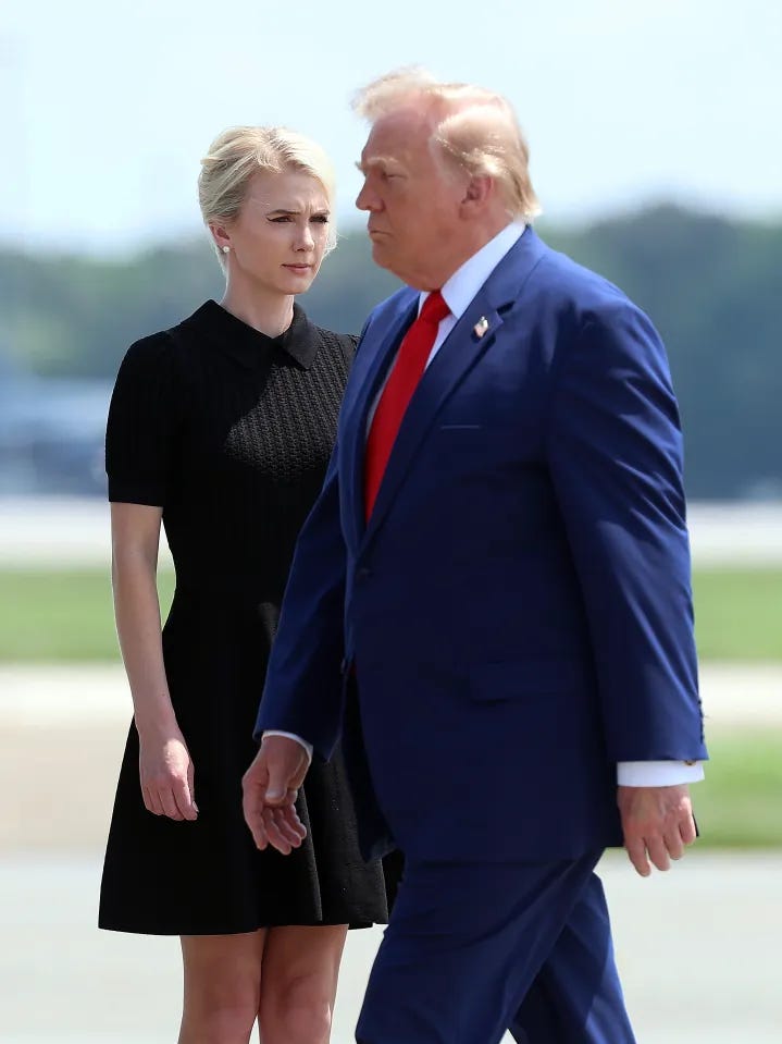 Natalie Harp, executive assistant to U.S. President Donald Trump, stands as President Trump arrives for a dignified transfer at Dover Air Force Base.