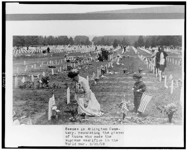 Scenes in Arlington Cemetery. Decorating the graves of those who made the supreme sacrifice in the World war Scenes in Arlington Cemetery. Decorating the graves of those who made the supreme sacrifice in the World war