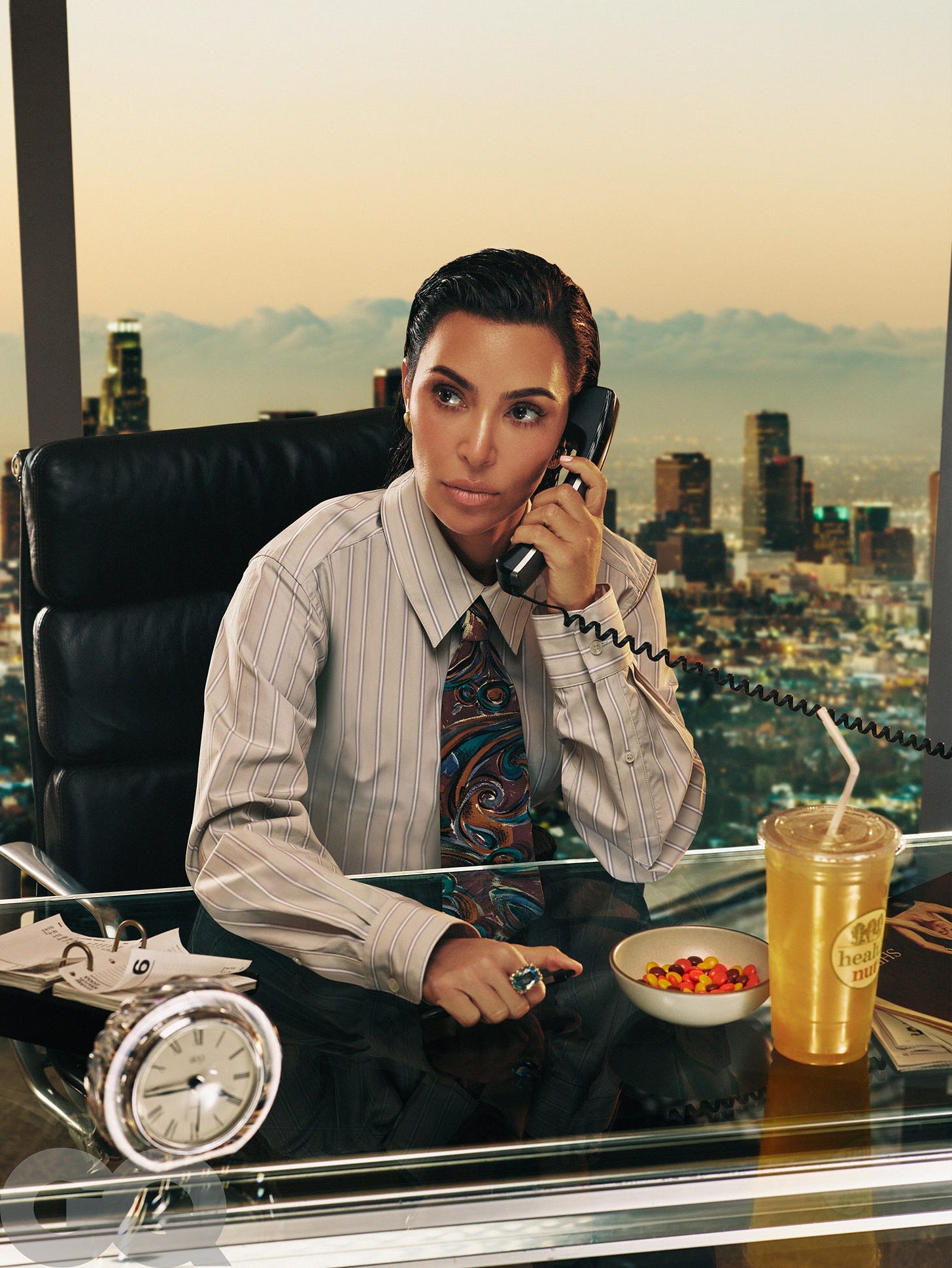 Shirt and trousers by Martine Rose. Tie by Wembley from Palace Costume. Earrings by XIV Karats. Ring by Chrome Hearts.