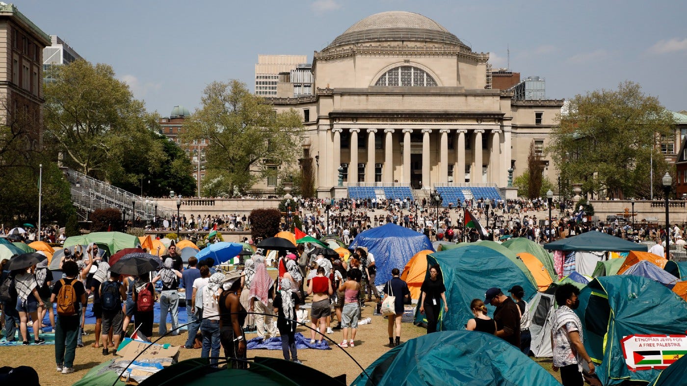Student protesters gather in protest inside their encampment on the Columbia University campus, Monday, April 29, 2024, in New York. Protesters of the war in Gaza who are encamped at Columbia University have defied a deadline to disband with chants, clapping and drumming. (AP Photo/Stefan Jeremiah) Student protesters gather in protest inside their encampment on the Columbia University campus, Monday, April 29, 2024, in New York. Protesters of the war in Gaza who are encamped at Columbia University have defied a deadline to disband with chants, clapping and drumming. (AP Photo/Stefan Jeremiah)