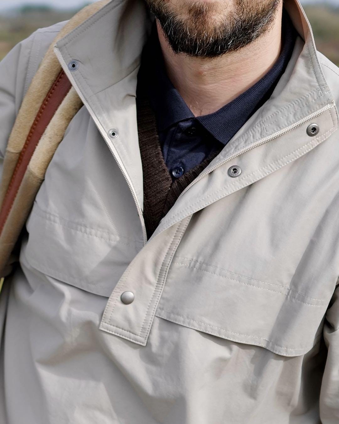 A person wearing a jacket

Description automatically generated