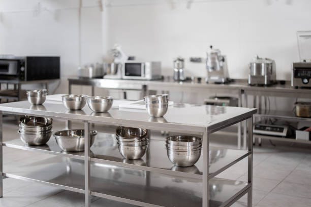 Professional restaurant kitchen with kitchen equipment Professional restaurant kitchen with kitchen equipment and stainless steel tables. Interior with no people empty kitchen classroom stock pictures, royalty-free photos & images Professional restaurant kitchen with kitchen equipment Professional restaurant kitchen with kitchen equipment and stainless steel tables. Interior with no people empty kitchen classroom stock pictures, royalty-free photos & images