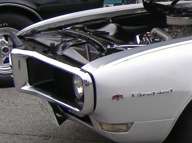 Just part of a picture I took of a sweet silver 1968-era Pontiac Firebird. It's all that fits here! Just part of a picture I took of a sweet silver 1968-era Pontiac Firebird. It's all that fits here!