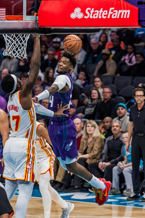 Frame by Frame: Hornets guard Brandon Miller dunks over Atlanta Hawks center Onyeka Okongwu. (Jorge Torres for Y’all Weekly)