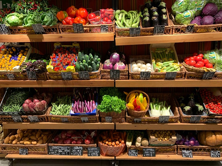 Woman in a grocery store. Fresh produce. Photos by Bernard Hermant and Raul Gonzalez Escobar via Unsplash.