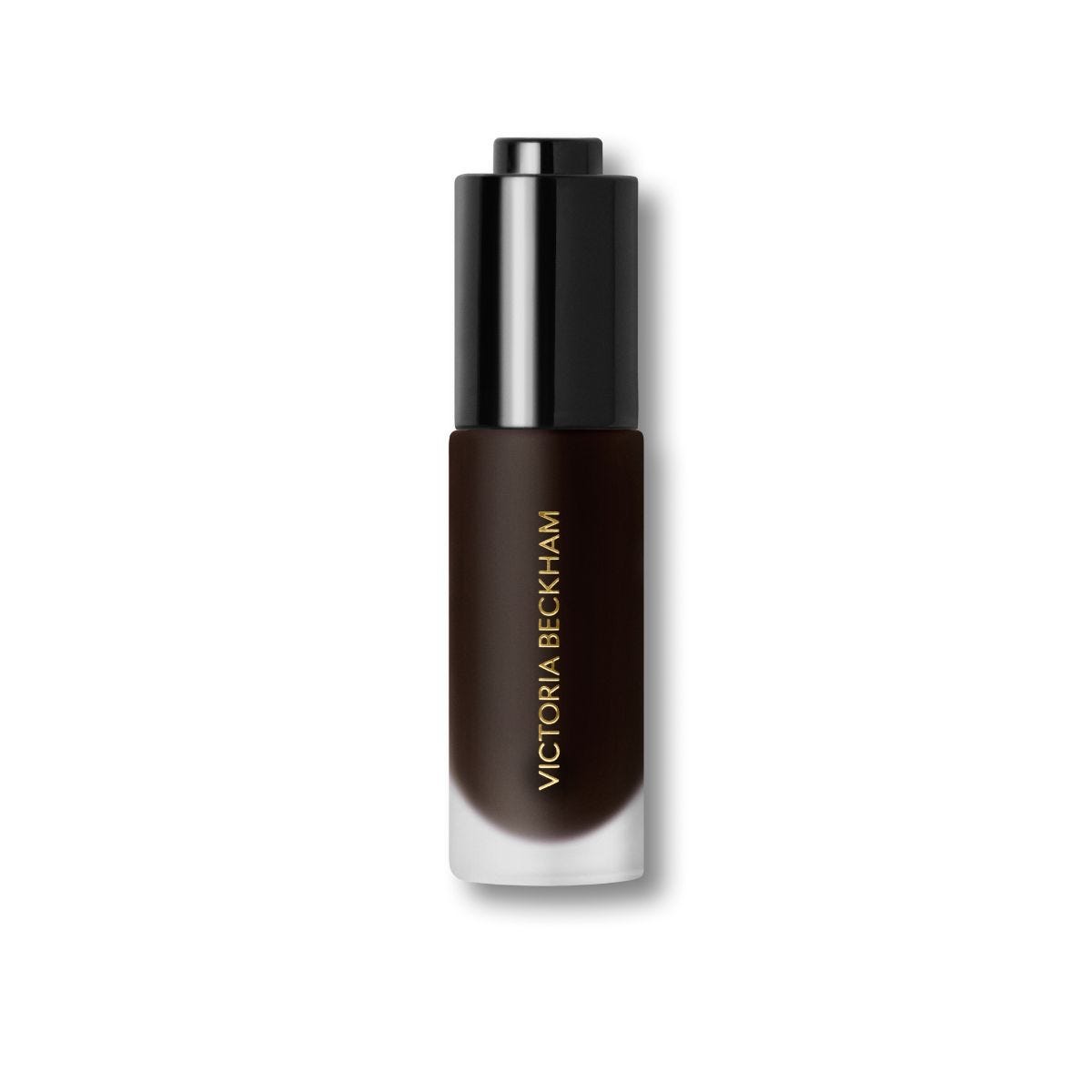 Victoria Beckham Beauty Colour Wash Bronze Water Tint bottle in the shade Tanline open showing the product liquid dropper for a sheer summer bronze
