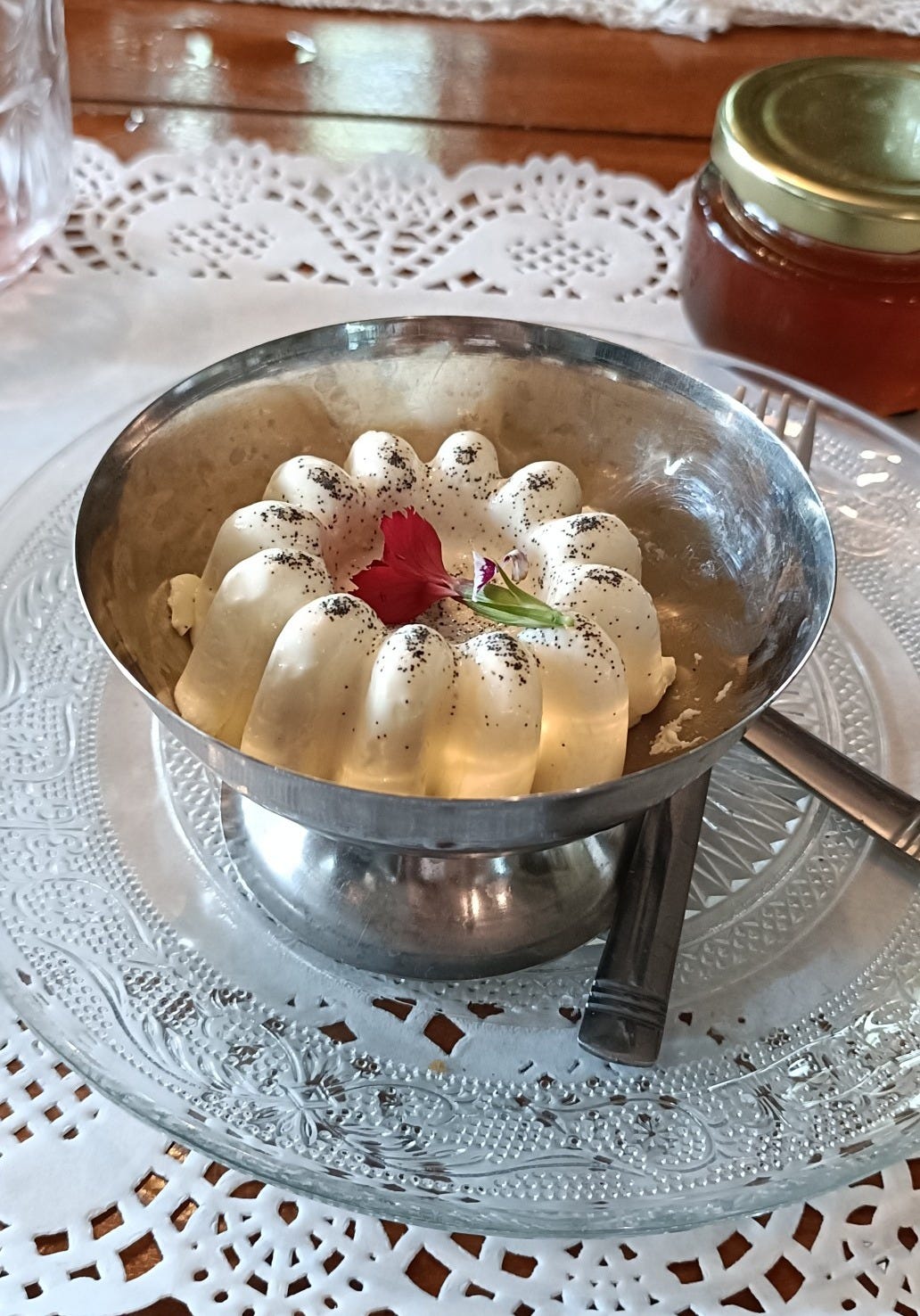 panna cotta with a pot of honey