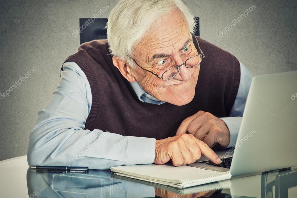 Elderly old man using laptop computer sitting at table — Stock Photo ©  SIphotography #65199211