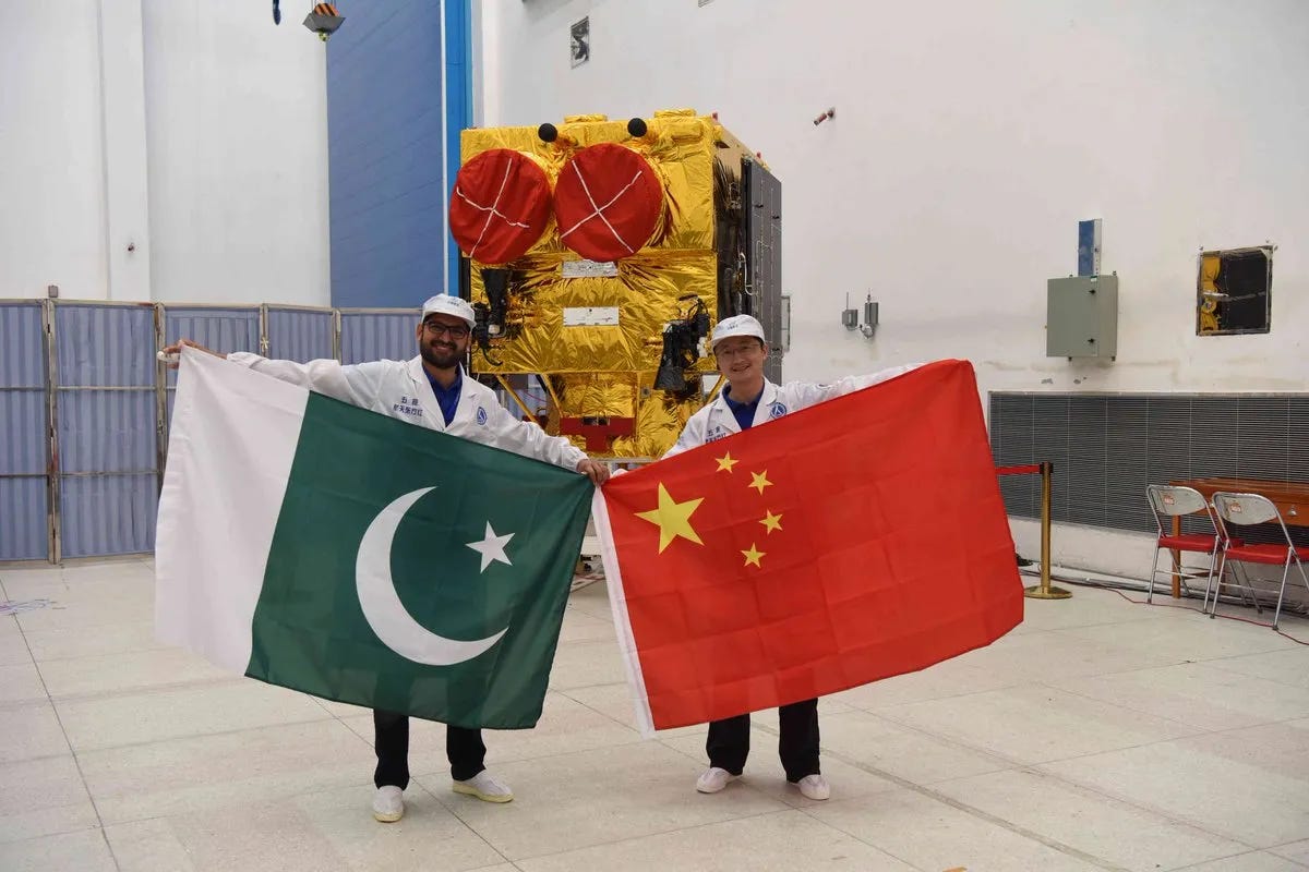 Members of a joint Pakistan-China team ahead of the launch of Pakistan Remote Sensing Satellite-1 in July 2018. Members of a joint Pakistan-China team ahead of the launch of Pakistan Remote Sensing Satellite-1 in July 2018.