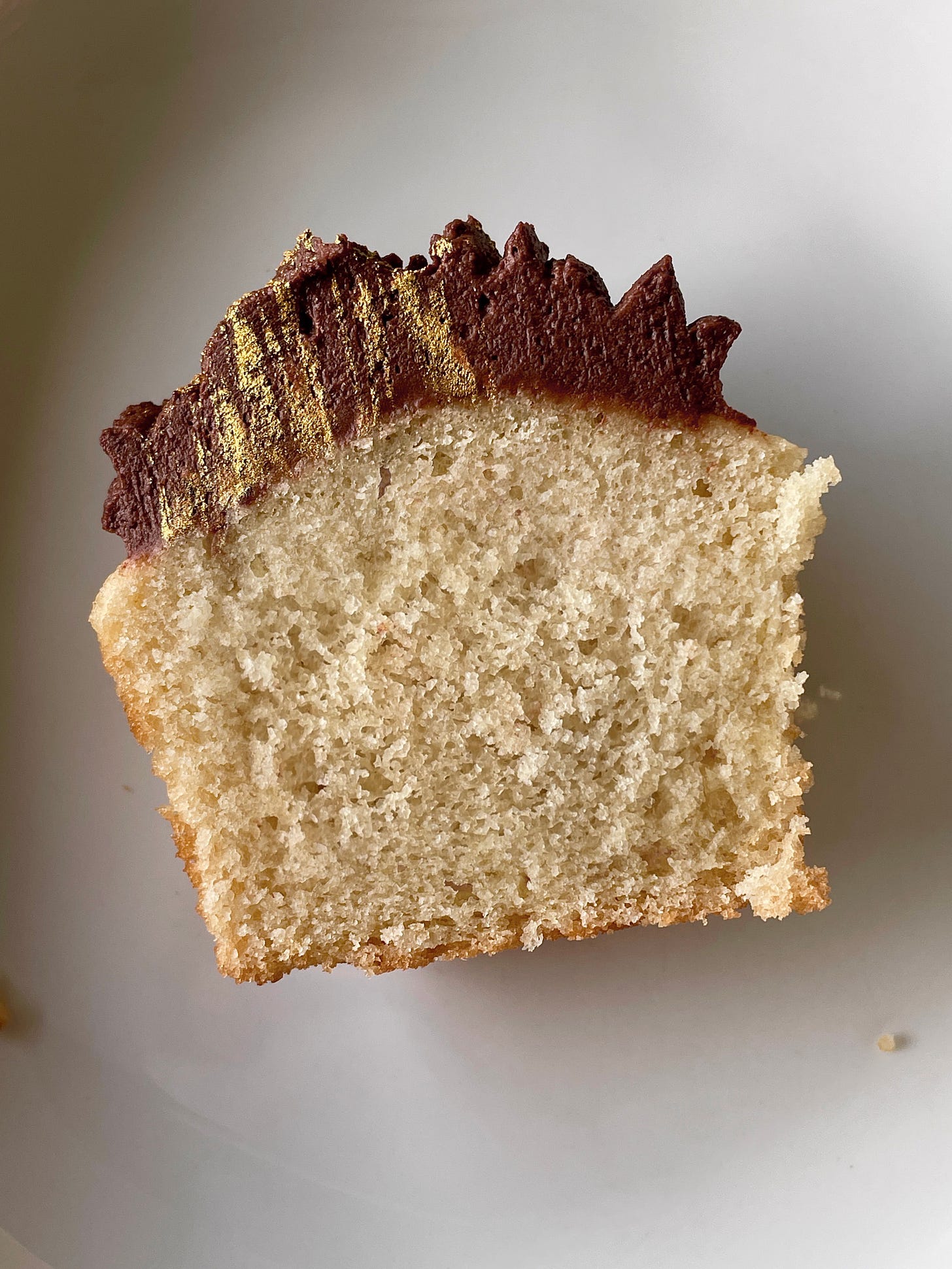 cross-section of moist vanilla cupcakes