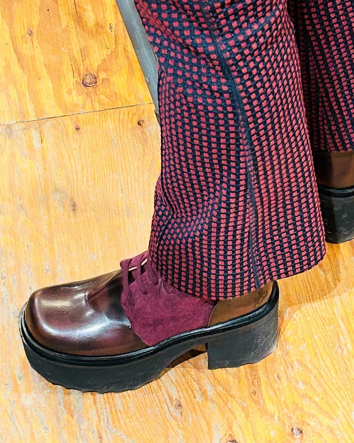 Poet Barbara Tran in a very fashionable pair of shoes.