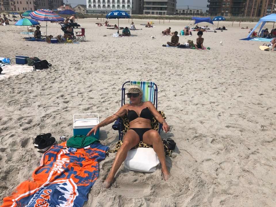 May be an image of 5 people and beach