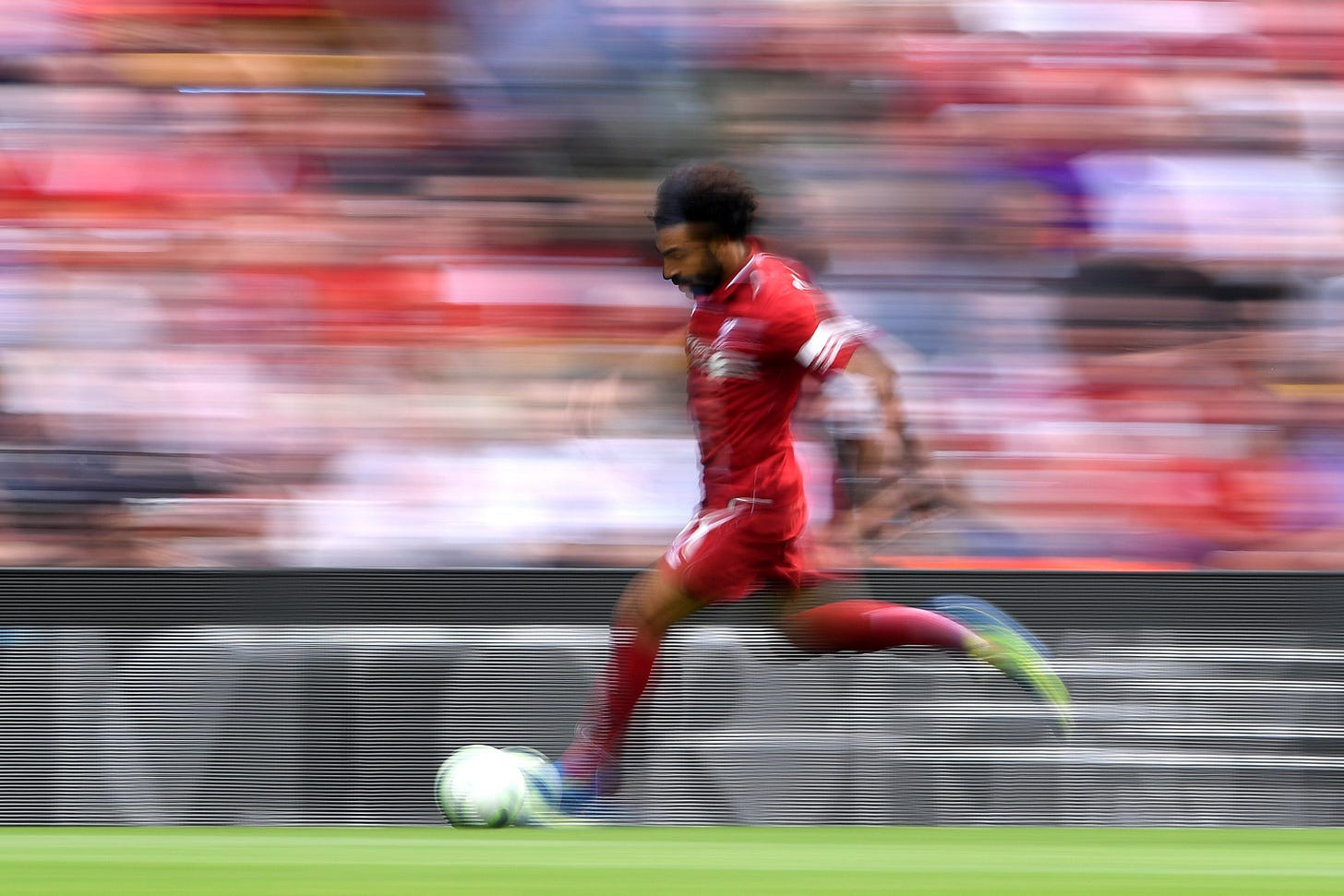 Mohamed Salah running with the ball