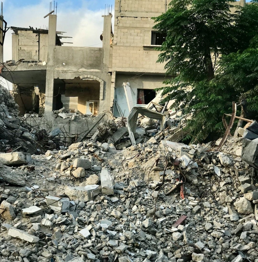 A large pile of rubble next to a building