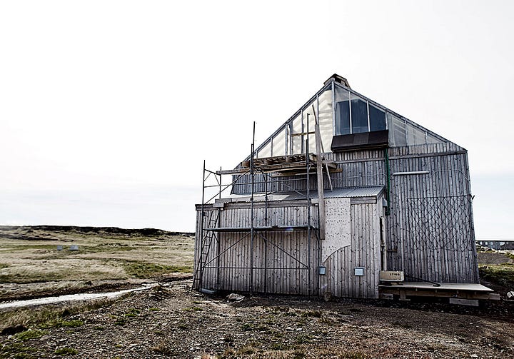 old builiding in iceland and a salt maker turning salt