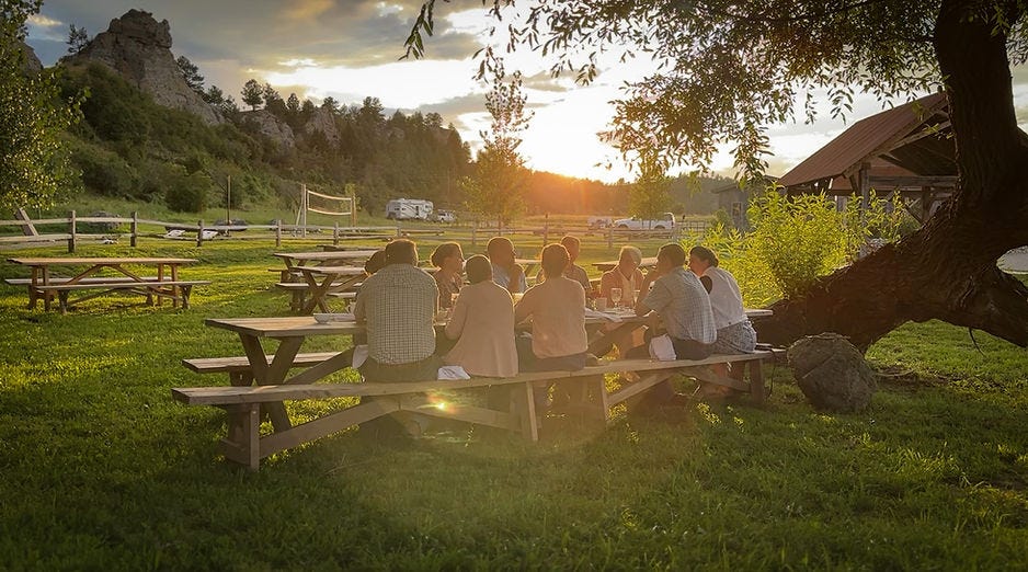 a A few of us gathered for a farm-to-table meal as the sun set over the cliffs behind us at Greycliff in Big Timber Montana. a A few of us gathered for a farm-to-table meal as the sun set over the cliffs behind us at Greycliff in Big Timber Montana.