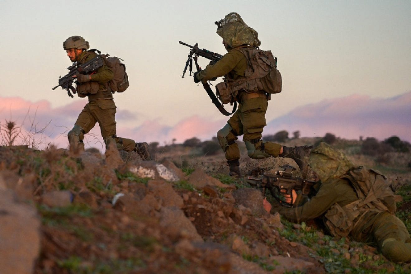 Soldiers from the IDF's Givati Brigade train near Kibbutz Merom Golan on the northern Golan Heights, Dec. 27, 2022. Photo by Michael Giladi/Flash90. Soldiers from the IDF's Givati Brigade train near Kibbutz Merom Golan on the northern Golan Heights, Dec. 27, 2022. Photo by Michael Giladi/Flash90.
