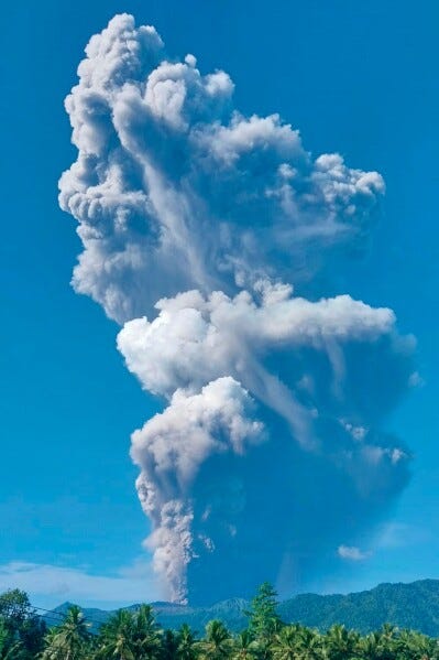 In this photo released by the Badan Geologi, the geological agency of Indonesia's Ministry of Energy and Mineral Resources, Mount Dukono releases volcanic materials during an eruption in North Halmahera, Indonesia, Friday, May 8, 2026. (Badan Geologi via AP)