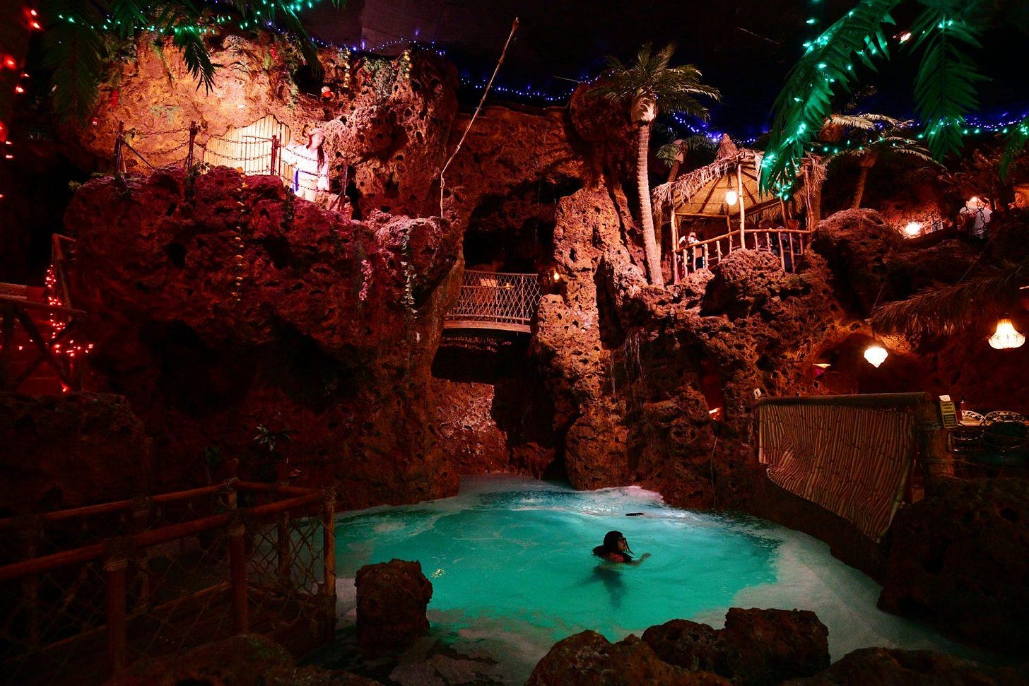 Mexican restaurant Casa Bonita has been a memory-making institution for decades. Here, a cliff-diver pauses during a show at the restaurant's three-story-tall indoor waterfall. (Hyoung Chang, The Denver Post)