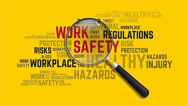 Workplace Safety And Risk Management A magnifying glass is positioned over a word cloud of terms related to occupational safety, including "WORK," "SAFETY," "RISKS," "PROTECTION," and "REGULATIONS." This conceptual graphic emphasizes the importance of risk management, adherence to safety protocols, and workplace hazard analysis. The vibrant yellow background draws attention to the critical message of prevention and employee wellbeing. This image is perfectly suited for corporate training materials, industrial safety presentations, and articles about human resources, compliance, and creating a secure work environment. risk assessment stock pictures, royalty-free photos & images