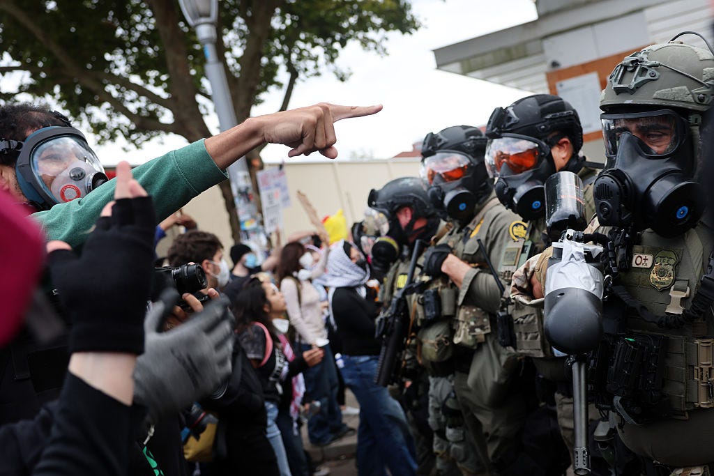 Trump says he's sending troops to Portland and Chicago, but some federal courts and officials are questioning his motives and the execution of the plan. (Spencer Platt / Getty Images)