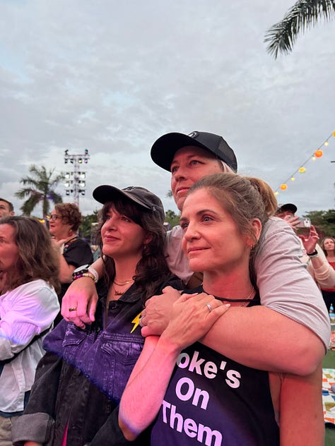 Photos of Meg and Glennon with new ear piercings, photo of Abby with her arms around Meg and Glennon, photo of Meg and Glennon about to hug in the ocean