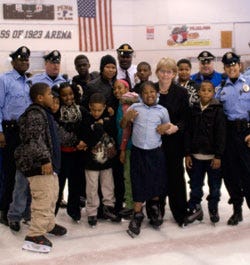 Maureen receiving an award from the Police Athletic League, which serves more than 26,000 kids across Philadelphia. Maureen receiving an award from the Police Athletic League, which serves more than 26,000 kids across Philadelphia.