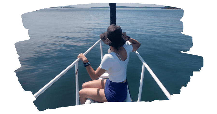 Sonia, founder of TheTechMargin at the bow of a friend's boat
