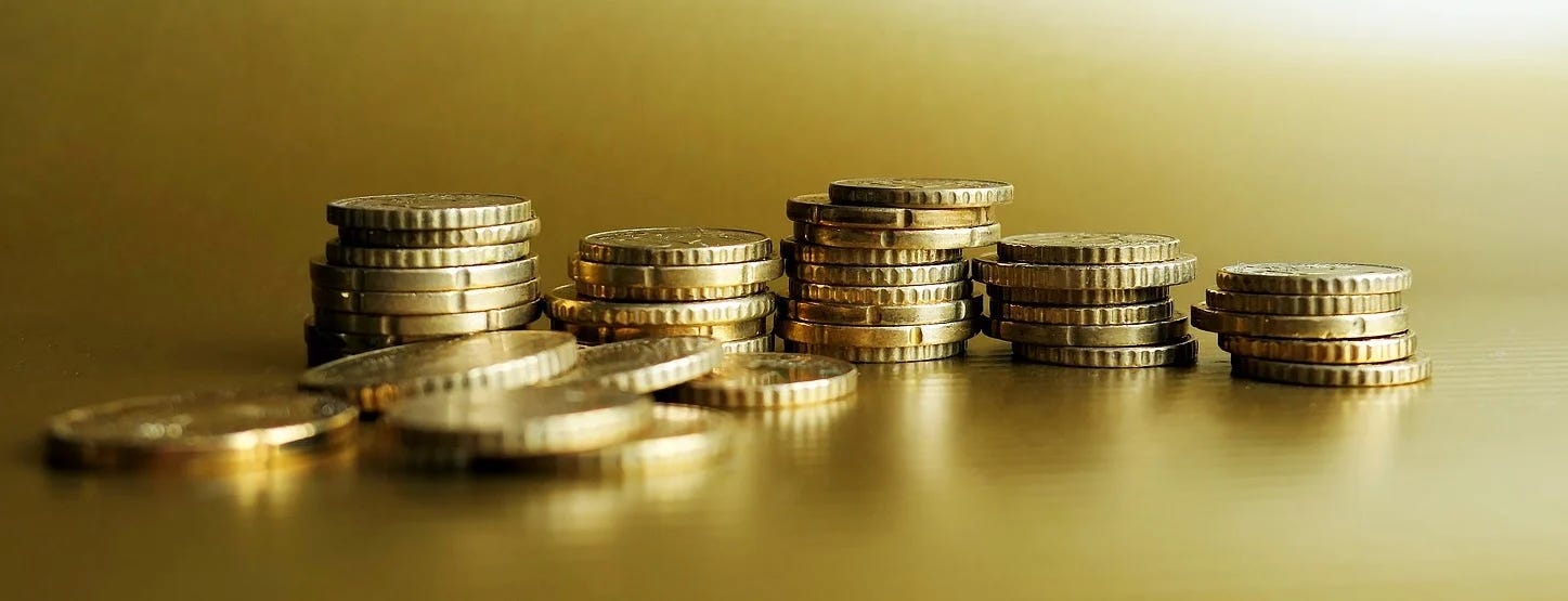 golden-coins-money-wealth-rich-finance-savings.webp