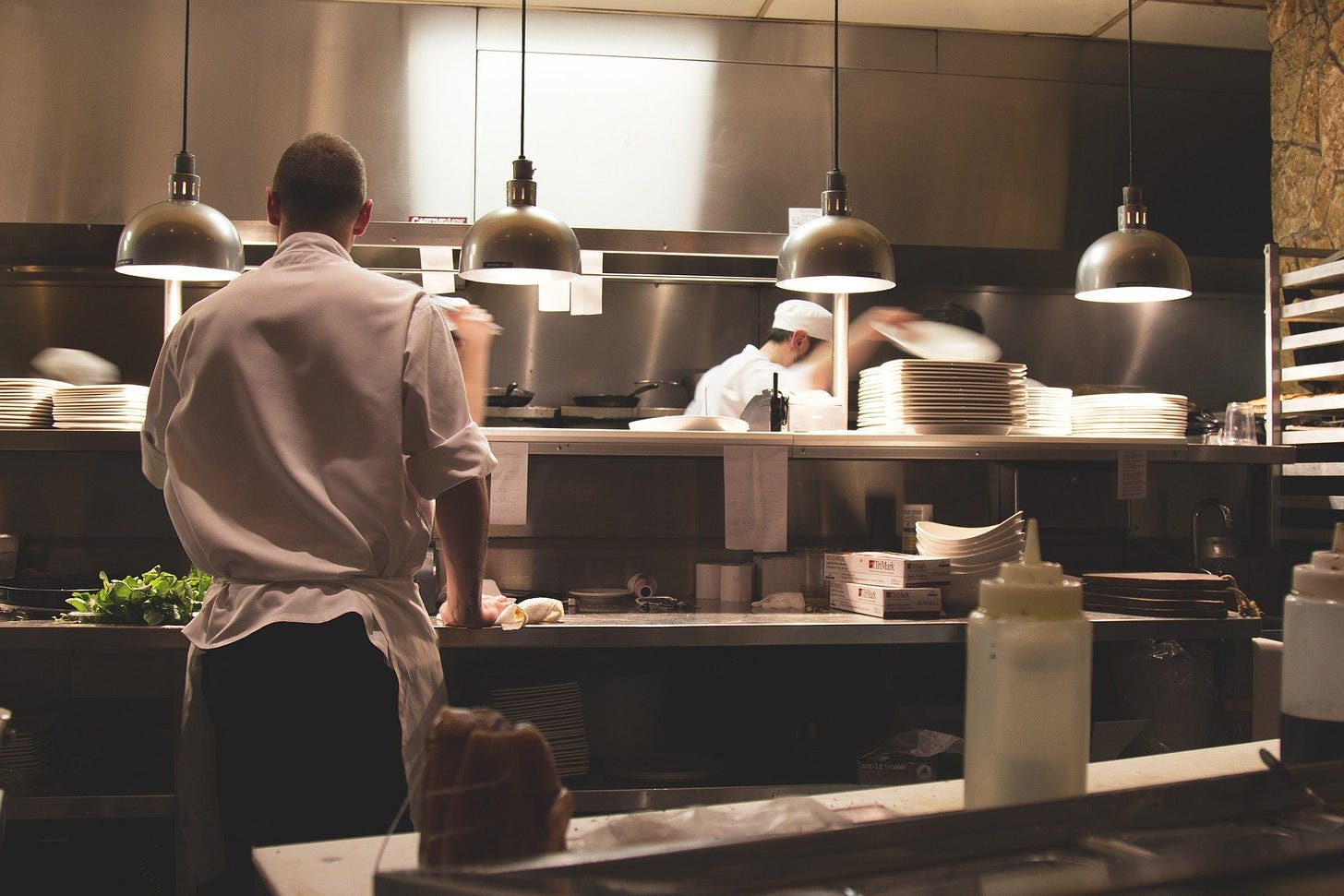 I wanted a picture of ghosts in a kitchen. This is just men in a kitchen. Boring.