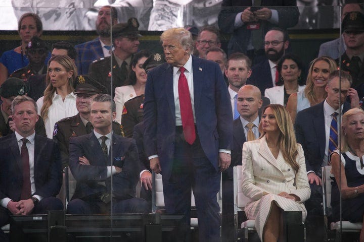 WASHINGTON, DC - JUNE 14:U.S. President Donald Trump, First Lady Melania Trump, and Defense Secretary Pete Hegseth along with other guests watch as members of the U.S Army participate in the 250th birthday parade of the U.S. Army June 14, 2025 in Washington, DC. The U.S. Army is marking its 250th birthday with a military parade including roughly 6,600 troops, 150 vehicles, and over 50 aircraft. The parade, which coincides with President Donald Trump's 79th birthday, is designed to tell the history of the U.S. Army.