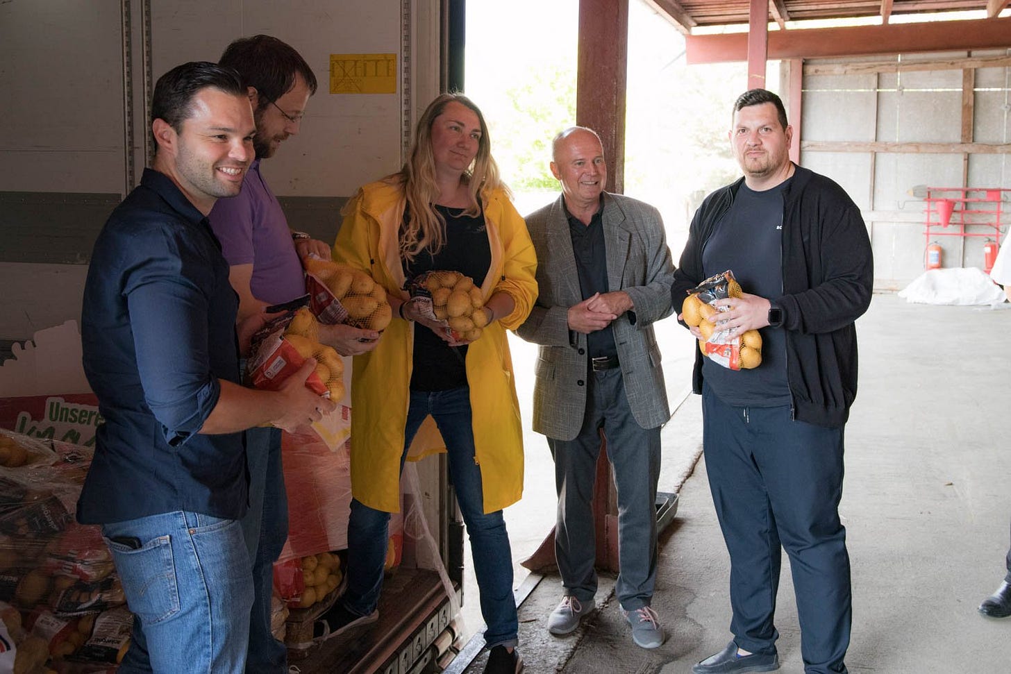 May be an image of 4 people, people standing and indoor