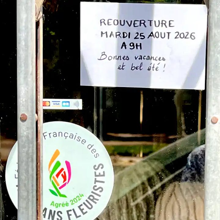 Photos of notices in shop windows informing customers that they will be closed over the summer