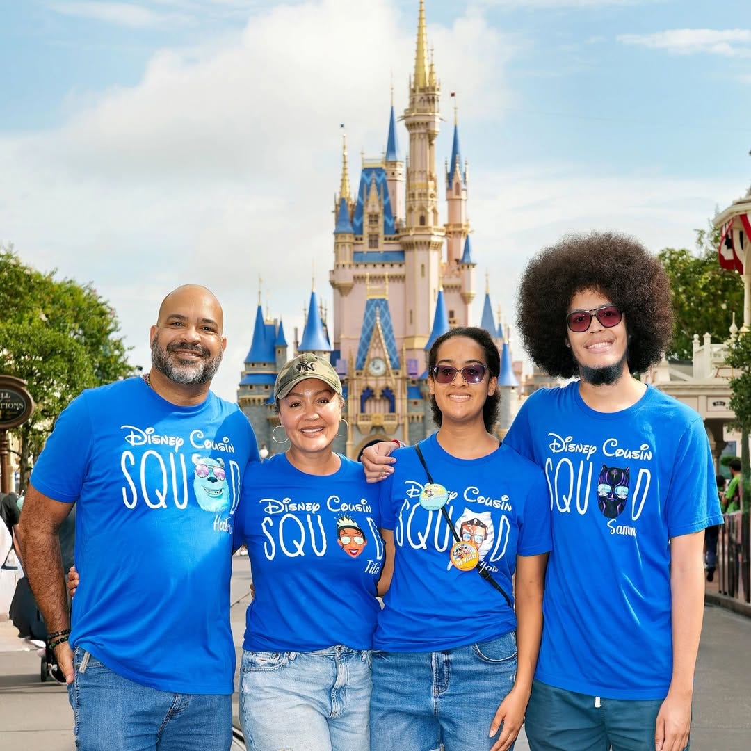Marta with husband and kids at Disney World Marta with husband and kids at Disney World