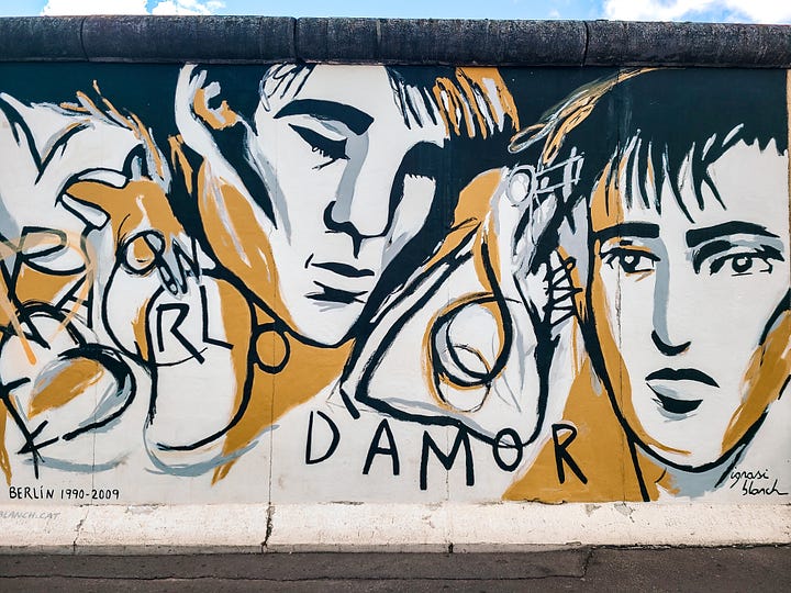 regular graffiti and East Side Gallery graffiti