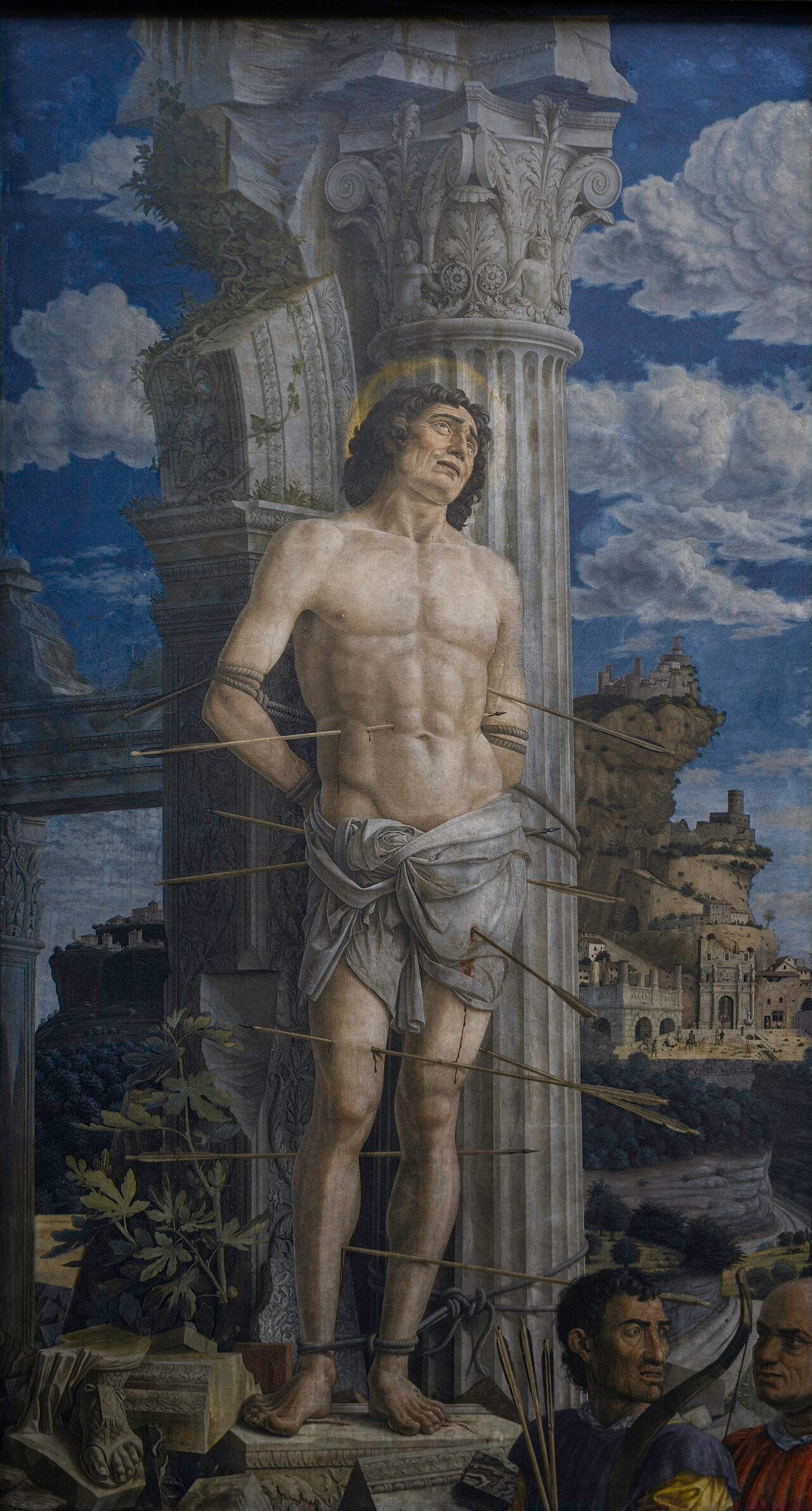 Saint Sebastian by Andrea Mantegna: the saint pierced with arrows against a ruined column, two archers at lower right