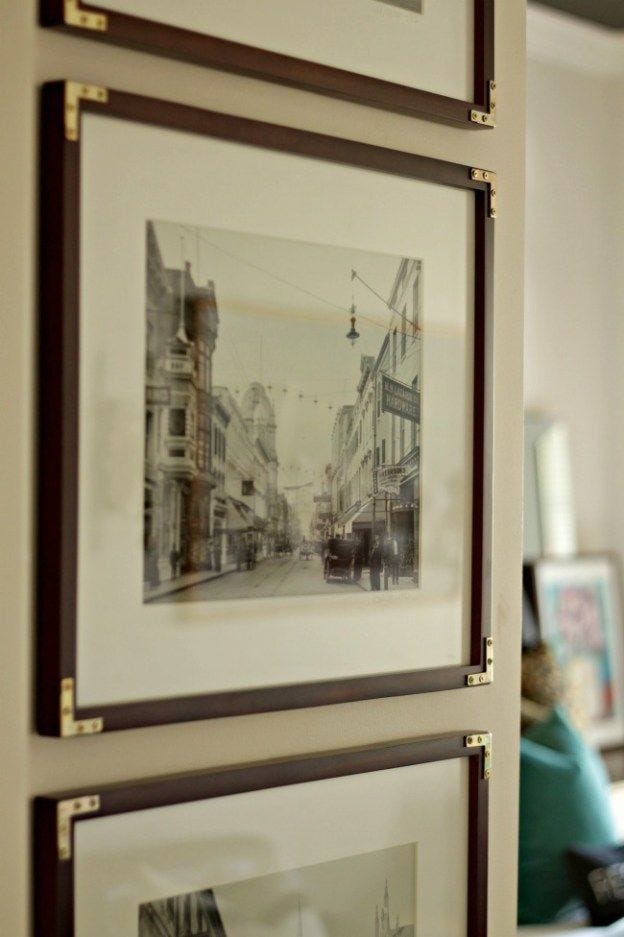 This may contain: two framed pictures hanging on the wall
