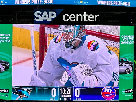 Images of a hockey rink, a hockey pride logo, three hockey players wearing the pride logo jersey
