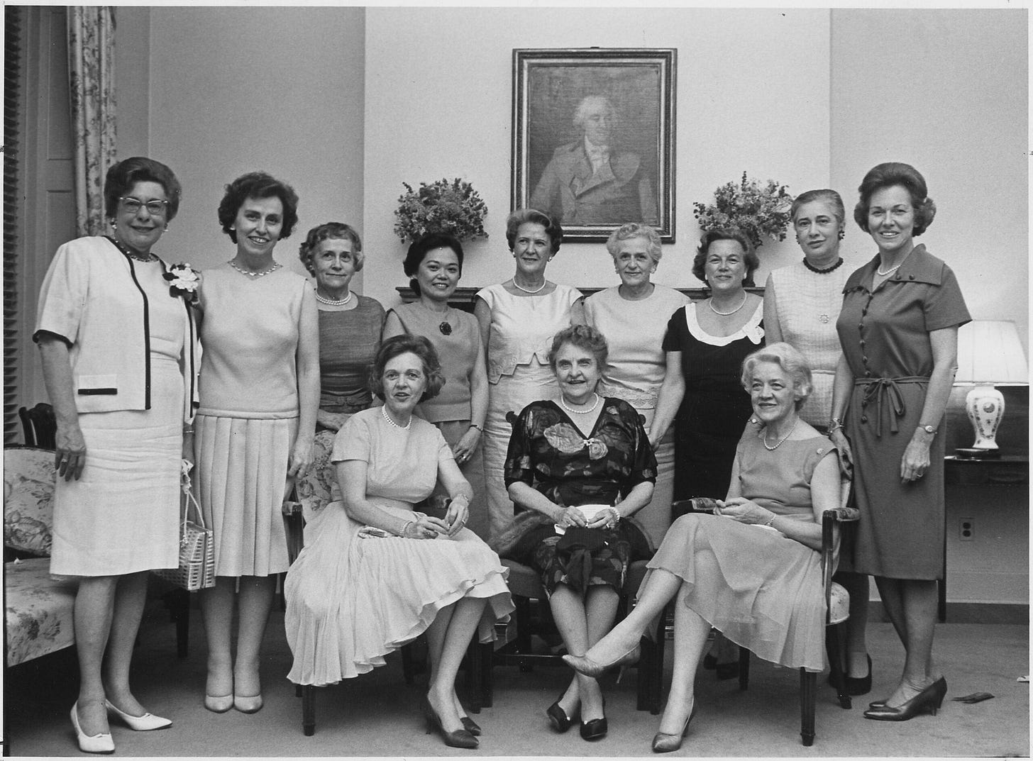 Edith Green of Oregon (third from top left) and Patsy Takemoto Mink of Hawaii (fourth from top left) stand with the congresswomen of the 89th Congress.