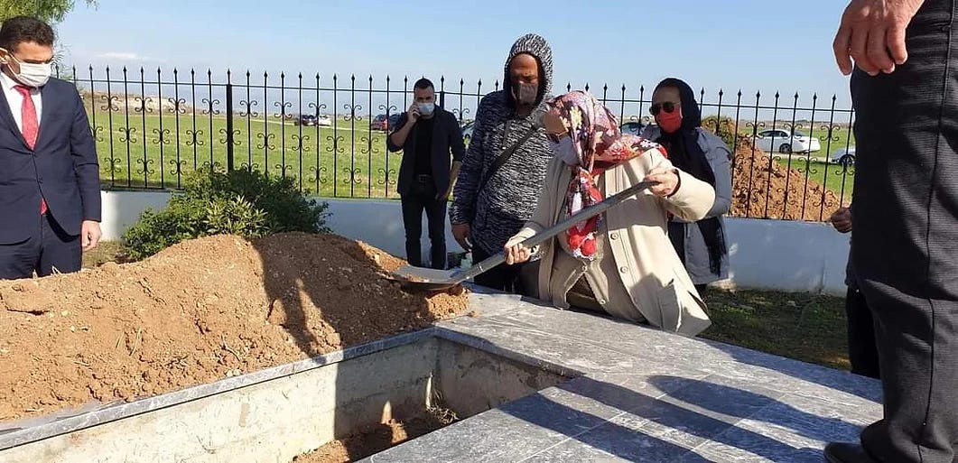 Woman buries and prays for children at their graves. The remains of 15 Turkish Cypriot civilians – including 14 women and children – slaughtered by Greek Cypriot regulars and irregulars in the North Cyprus village of Muratağa on 14 August, 1974, have been finally laid to rest in their own graves. Woman buries and prays for children at their graves. The remains of 15 Turkish Cypriot civilians – including 14 women and children – slaughtered by Greek Cypriot regulars and irregulars in the North Cyprus village of Muratağa on 14 August, 1974, have been finally laid to rest in their own graves.