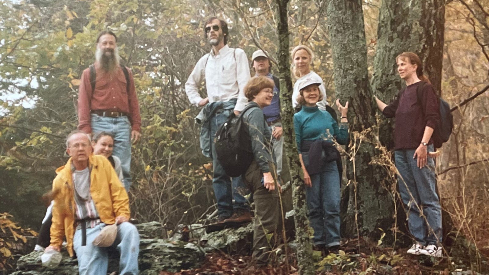 Susie Hamrick Jones hiking with several friends in a forested area