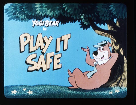 Opening slides of several educational filmstrips. Yogi Bear in "Play it Safe," The Flintstones in "A Weighty Problem," "Bamm-Bamm Tackles a Term Paper," The Jetsons "Down to Earth Nutrition," The Flintstones "Driving Guide," Jabberjaw in "The Silent Hunters," "Around the World Kids Visit Saitama, Japan," Scooby Doo in "Let's Go to Press Part II: News Reporting"