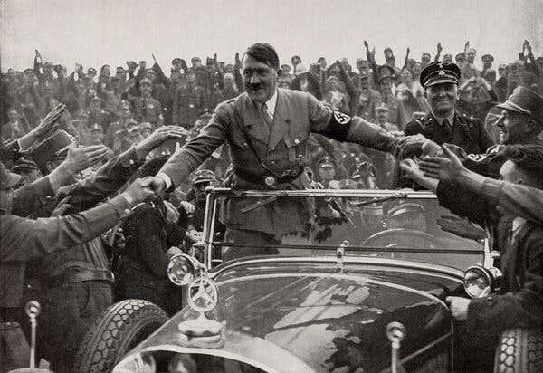 A black-and-white photograph of Hitler in 1933.