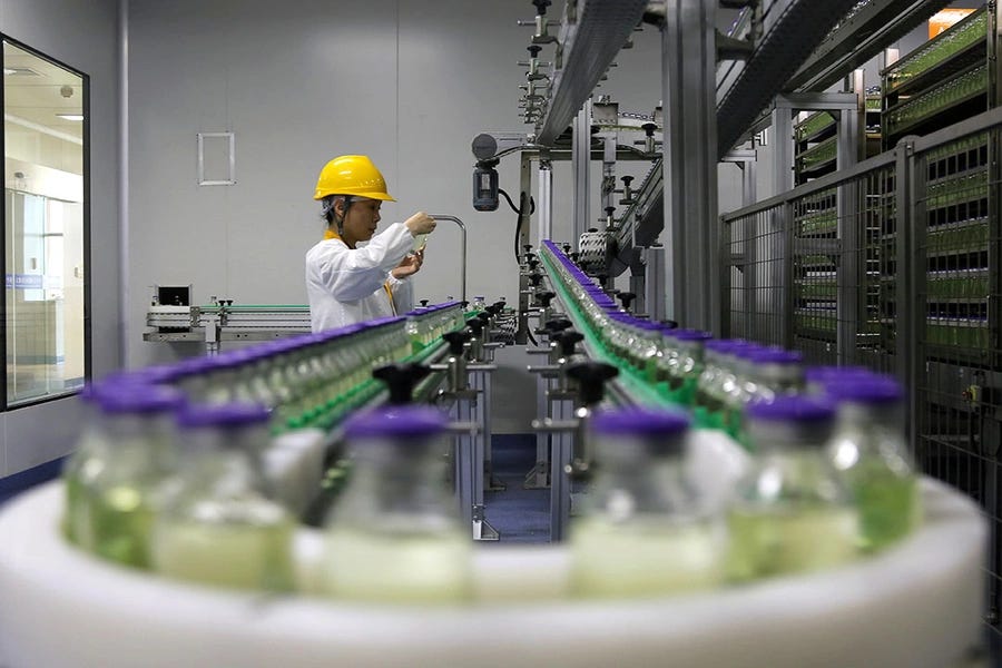 An employee works on a production line manufacturing drugs at the Yangtze River Pharmaceutical Group in Taizhou, Jiangsu province, China, September 3, 2019 An employee works on a production line manufacturing drugs at the Yangtze River Pharmaceutical Group in Taizhou, Jiangsu province, China, September 3, 2019