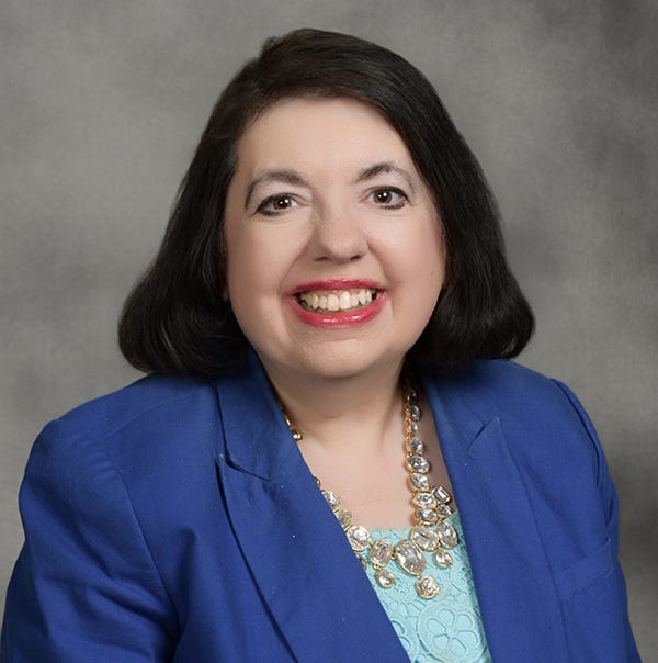 Maria V Gallagher