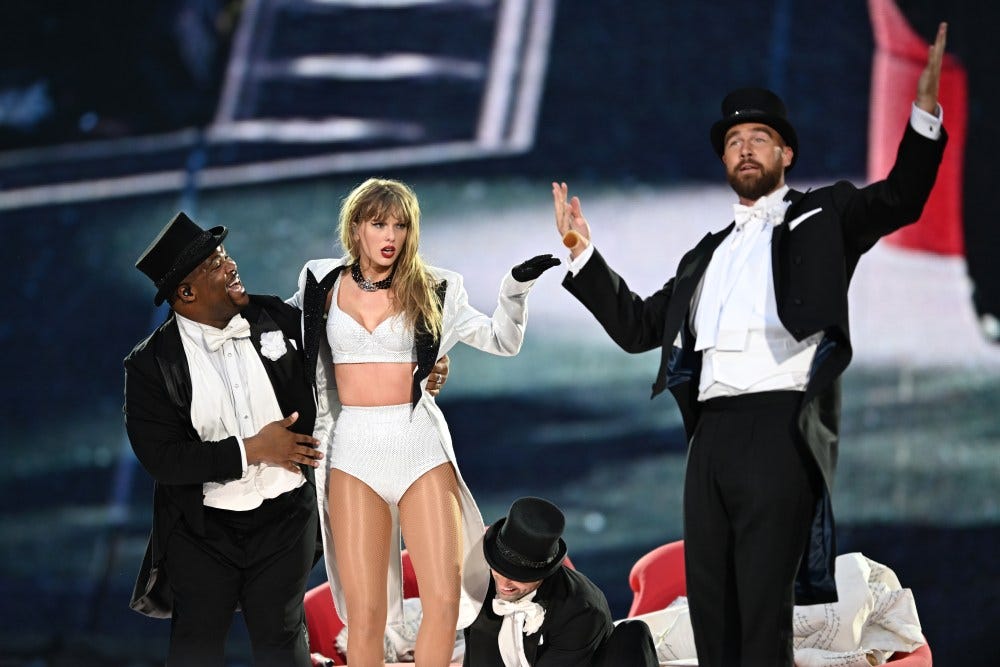 Travis Kelce Joins Taylor Swift on Stage for Surprise Eras Tour Appearance